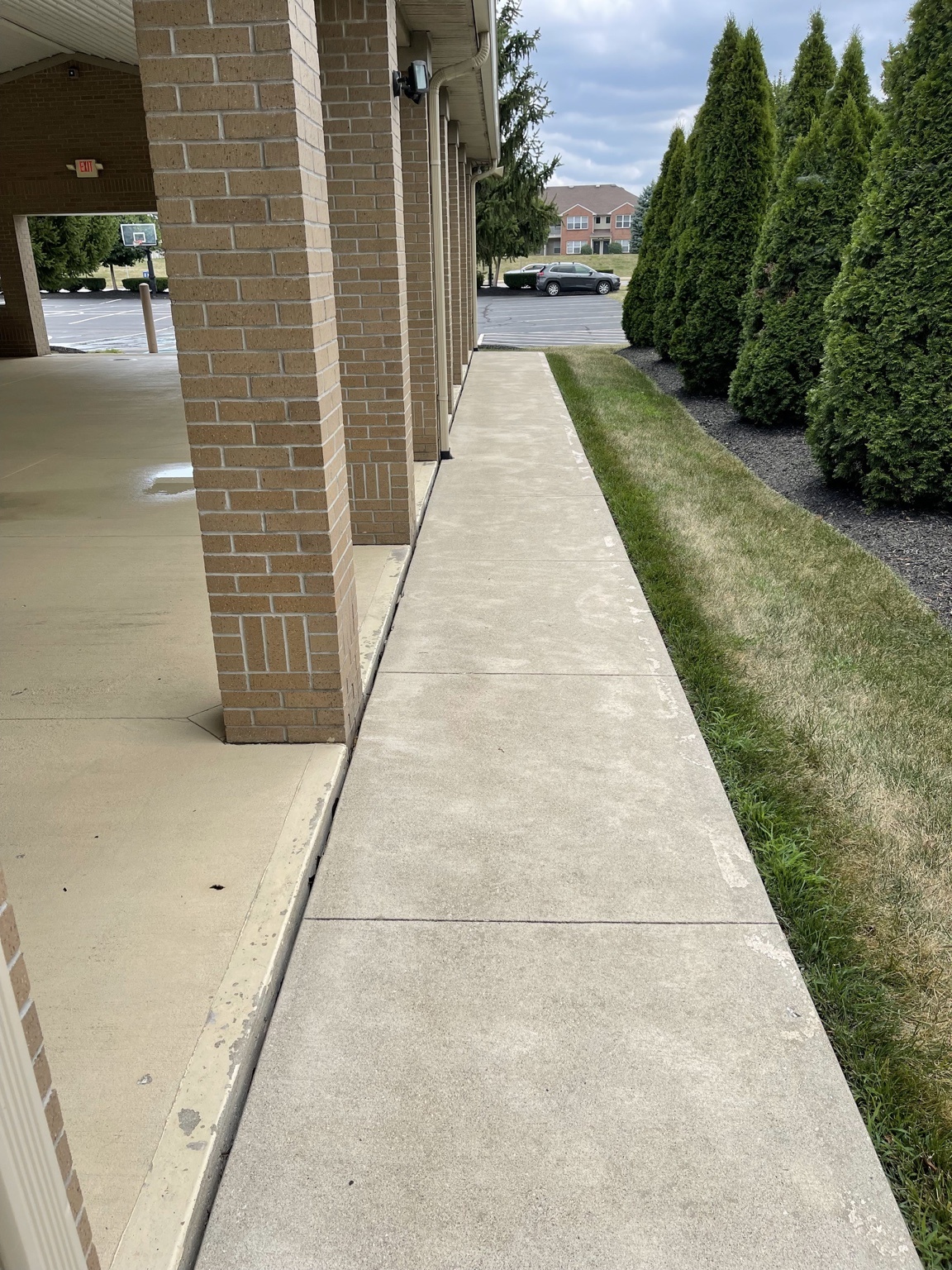 Clean sidewalk after pressure washing