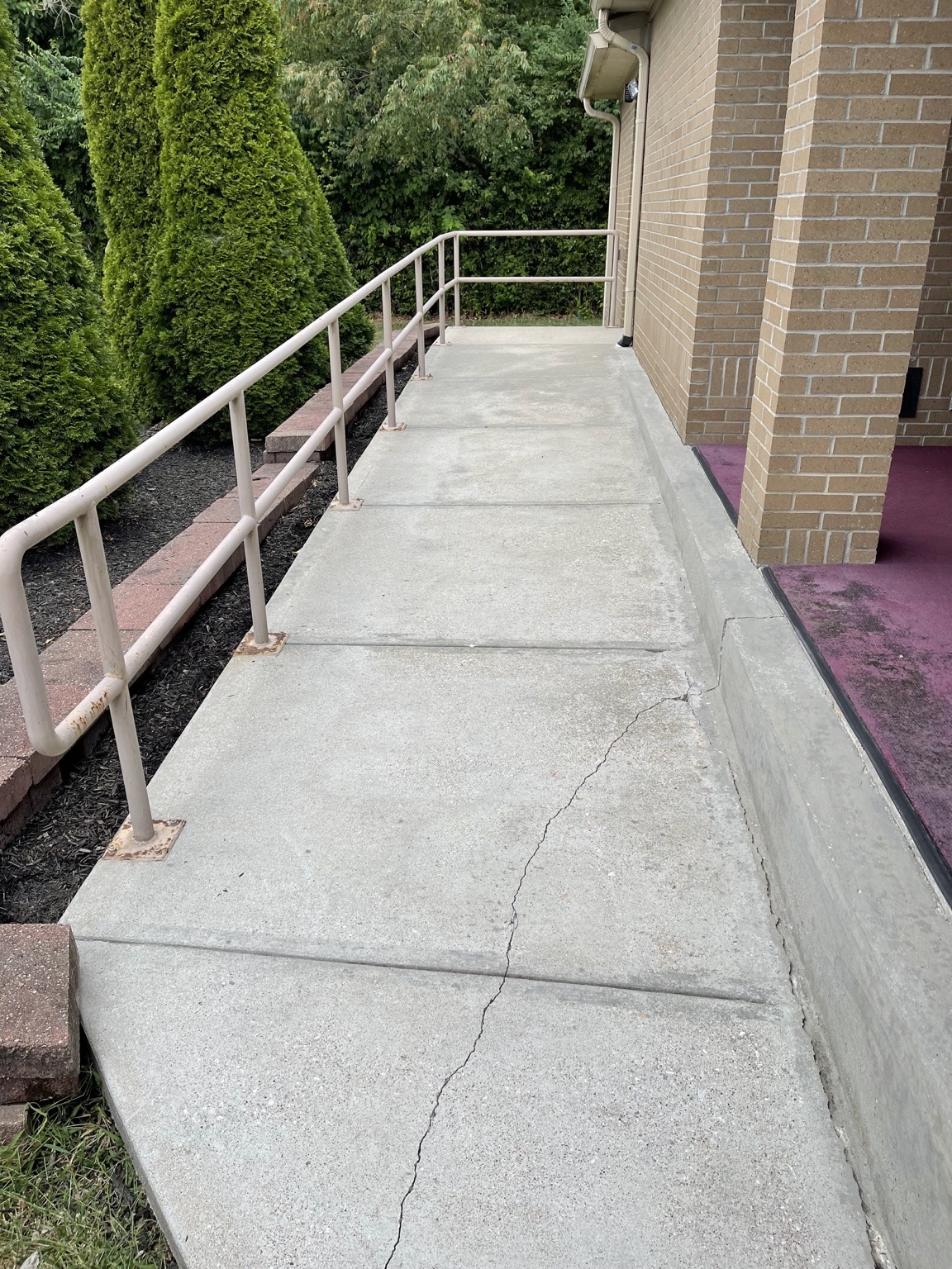 Clean concrete ramp after pressure washing