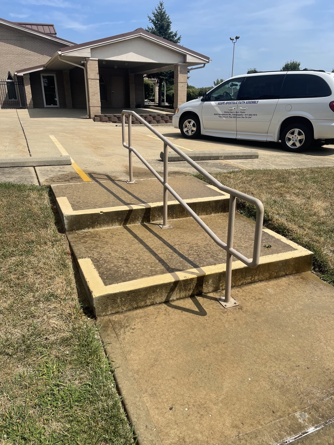 Stained concrete entry steps before cleaning