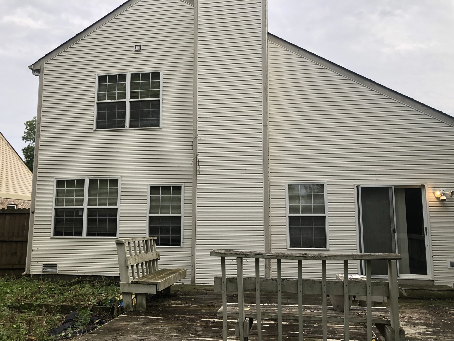 Clean vinyl siding after pressure washing